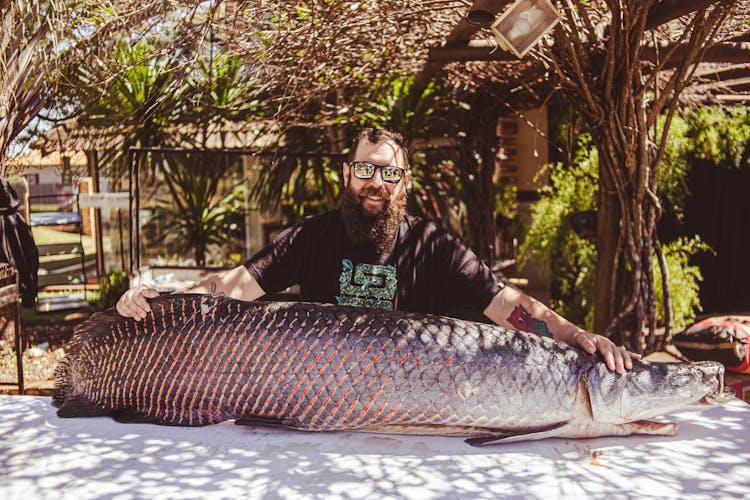 Bearded Man With Giant Fish