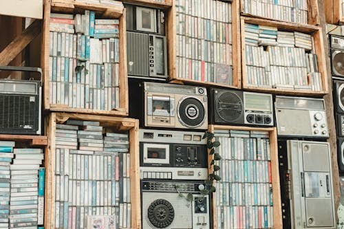 View of Shelves with Vintage Cassette Players and Cassette Tapes 