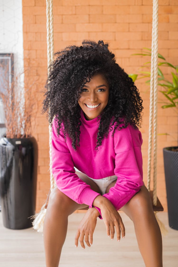 Smiling Woman With Curlt Hair