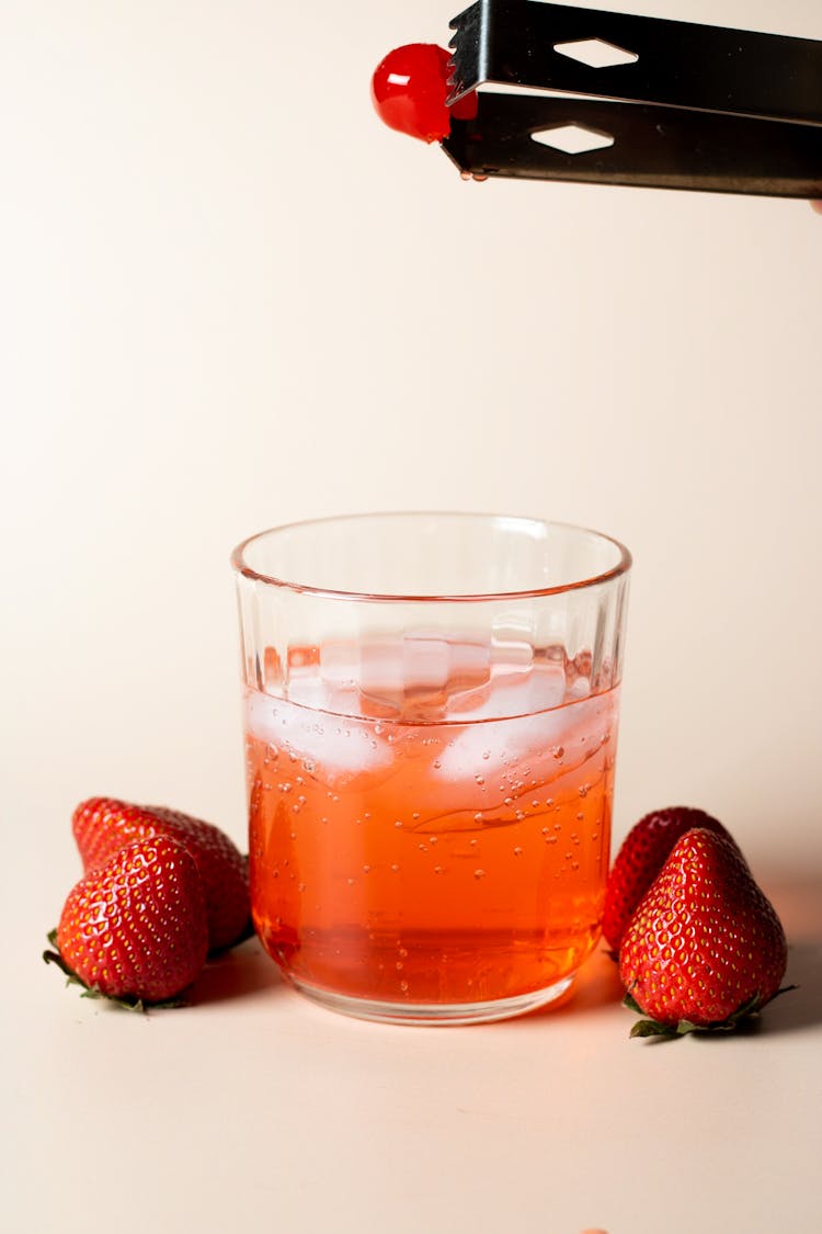 Glass With Juice And Ice Cubes 