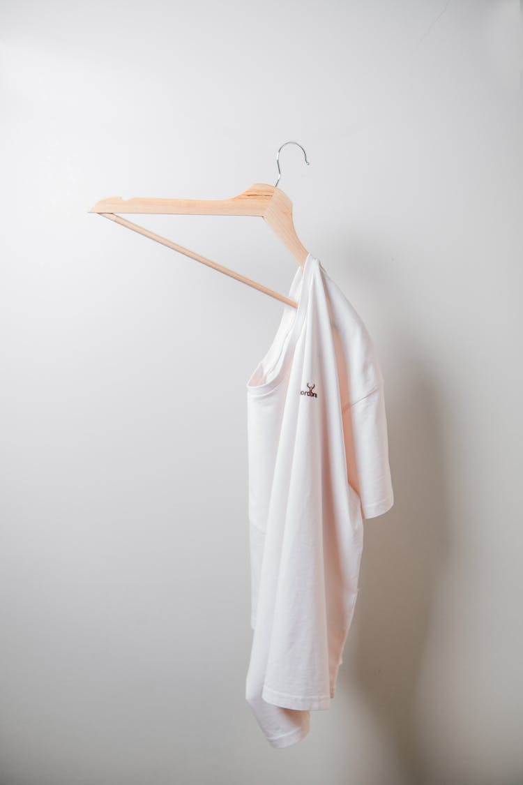 White T Shirt Falling On The Hanger