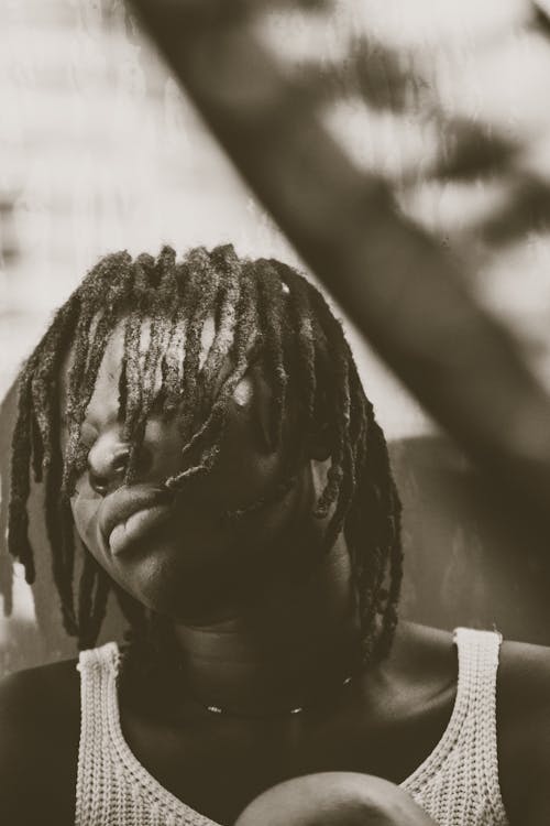 Free Black and White Photo of a Woman with Dreadlocks Stock Photo