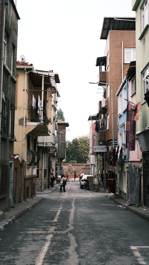 Narrow Street between Concrete Buildings