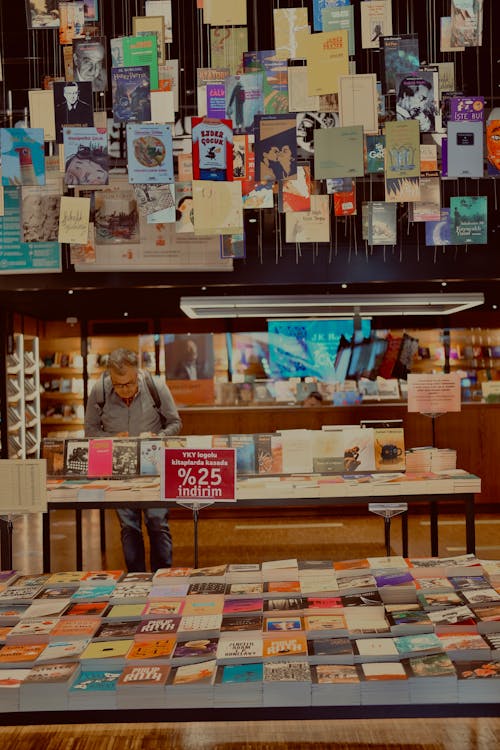 A Gray Haired Man at the Bookstore 