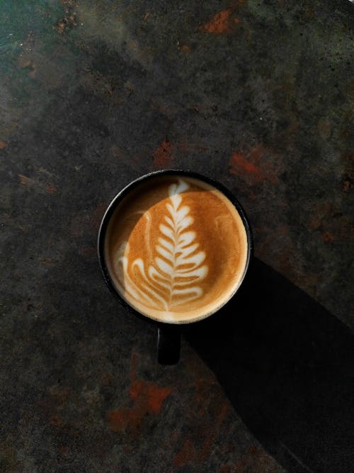 Free Ceramic Cup with Latte Coffee Stock Photo