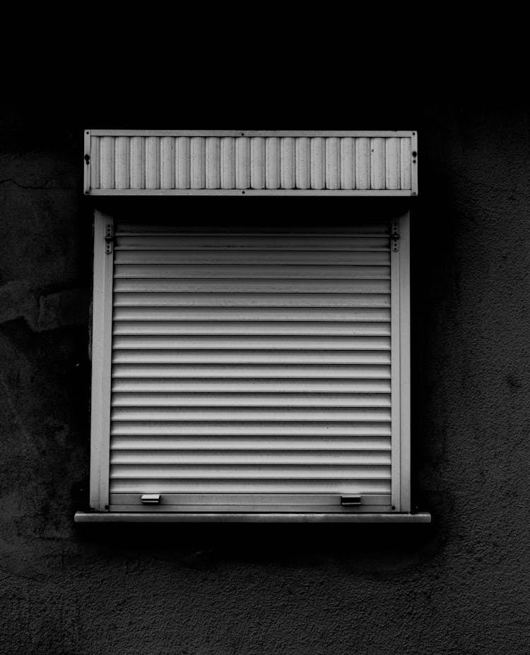 Grayscale Photo Of A Wooden Window