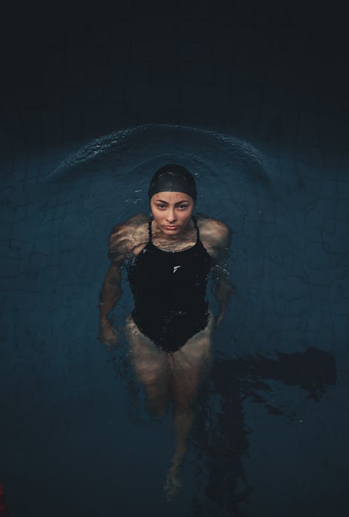 Woman Swimmer Floating on Water