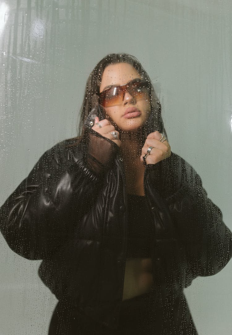 Woman In Black Leather Jacket Wearing Black Framed Eyeglasses