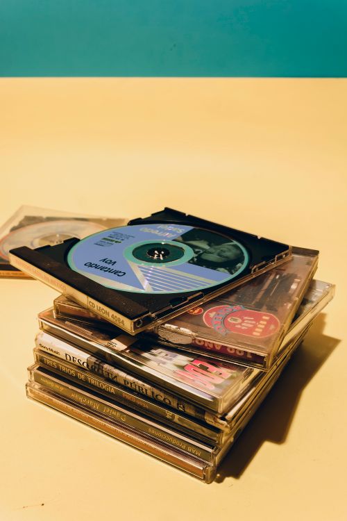 Pile of CD Discs · Free Stock Photo