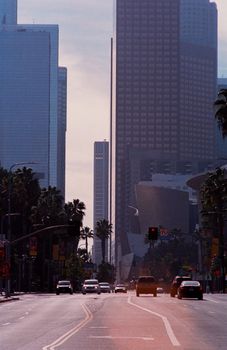A bustling downtown scene with high-rises and traffic, capturing urban life.