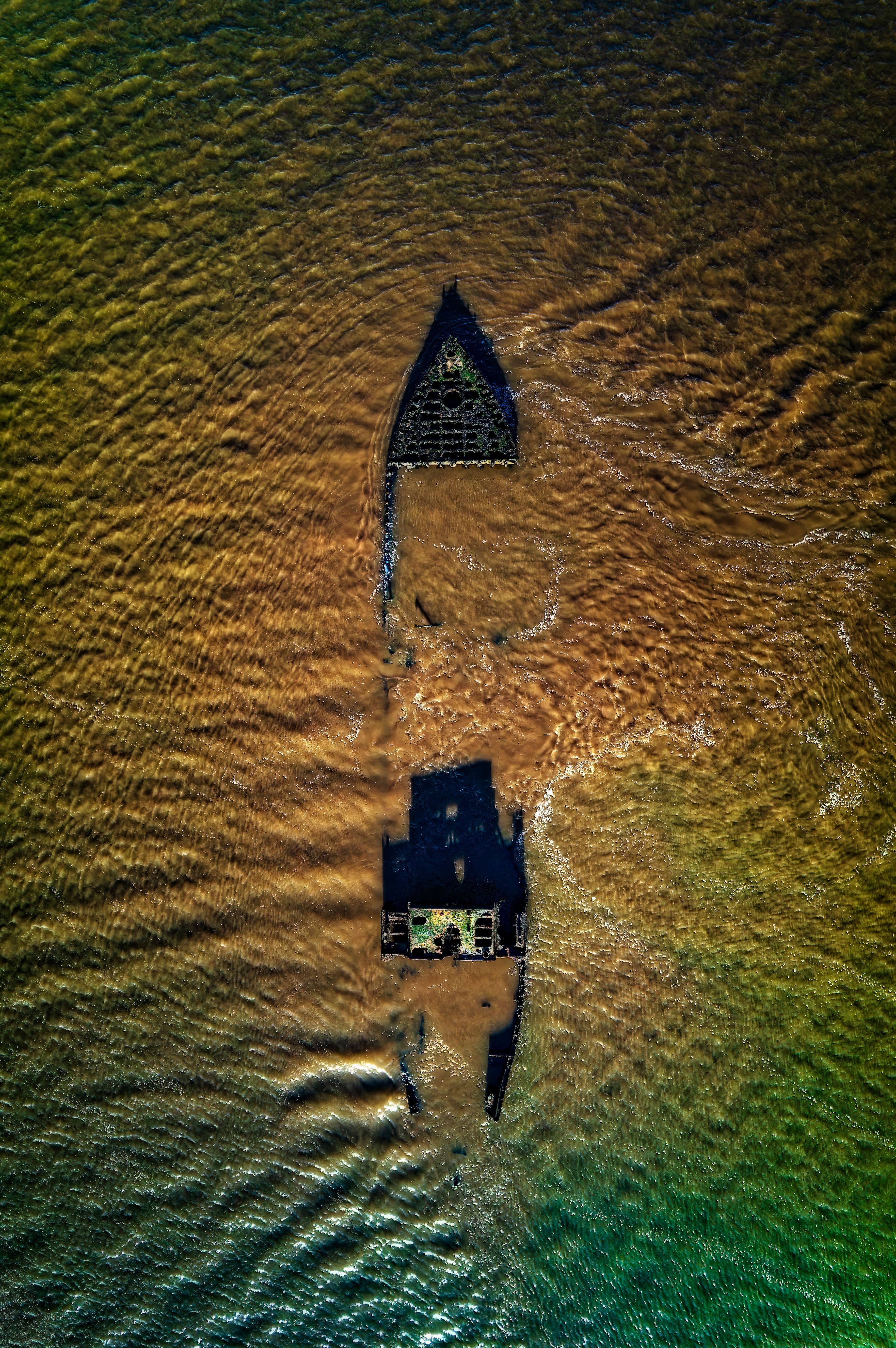 Drone shot of a submerged shipwreck off the coast of Exmouth, UK.