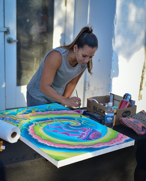 Woman Painting on Canvas