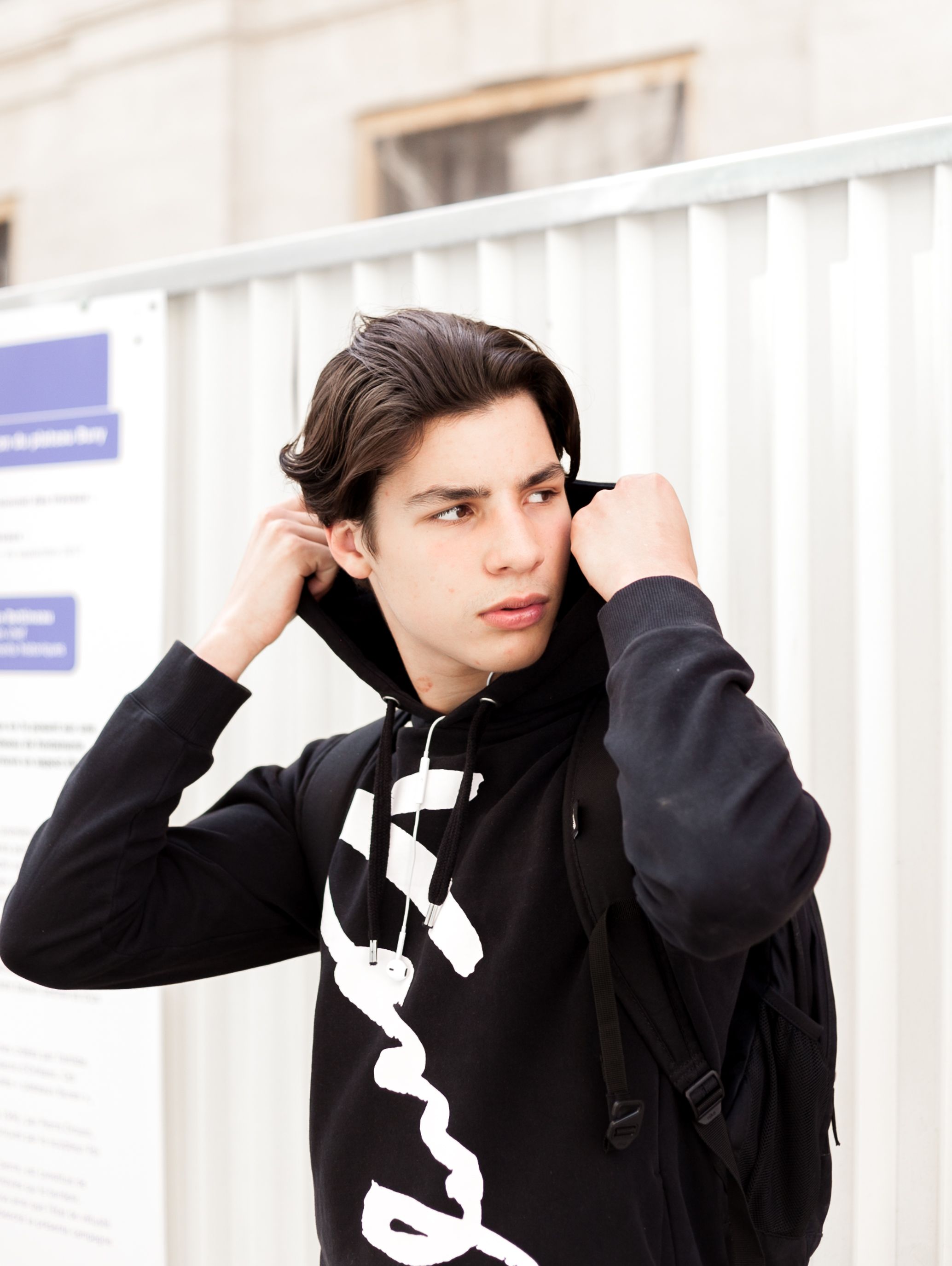 Close-Up Shot of a Boy Wearing Black Hoodie · Free Stock Photo