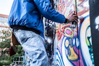 Photo of Person Painting Graffiti