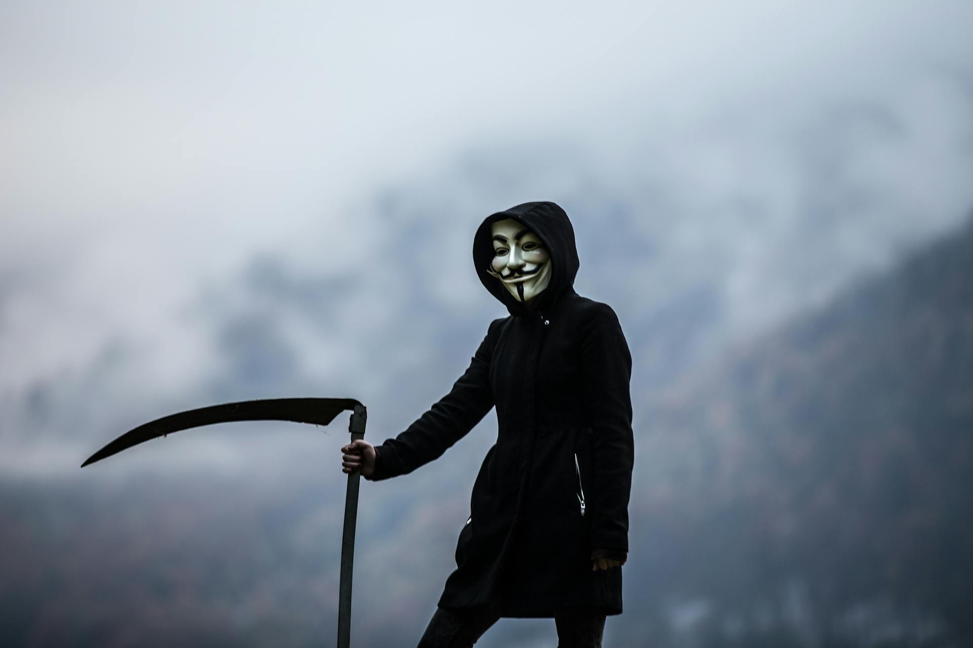 Photo of Person Wearing Guy Fawkes Mask