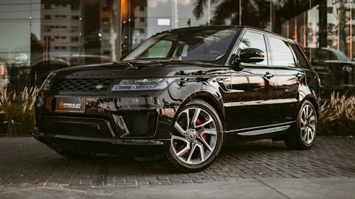 Free Black Range Rover Parked on Gray Stone Pavement Stock Photo