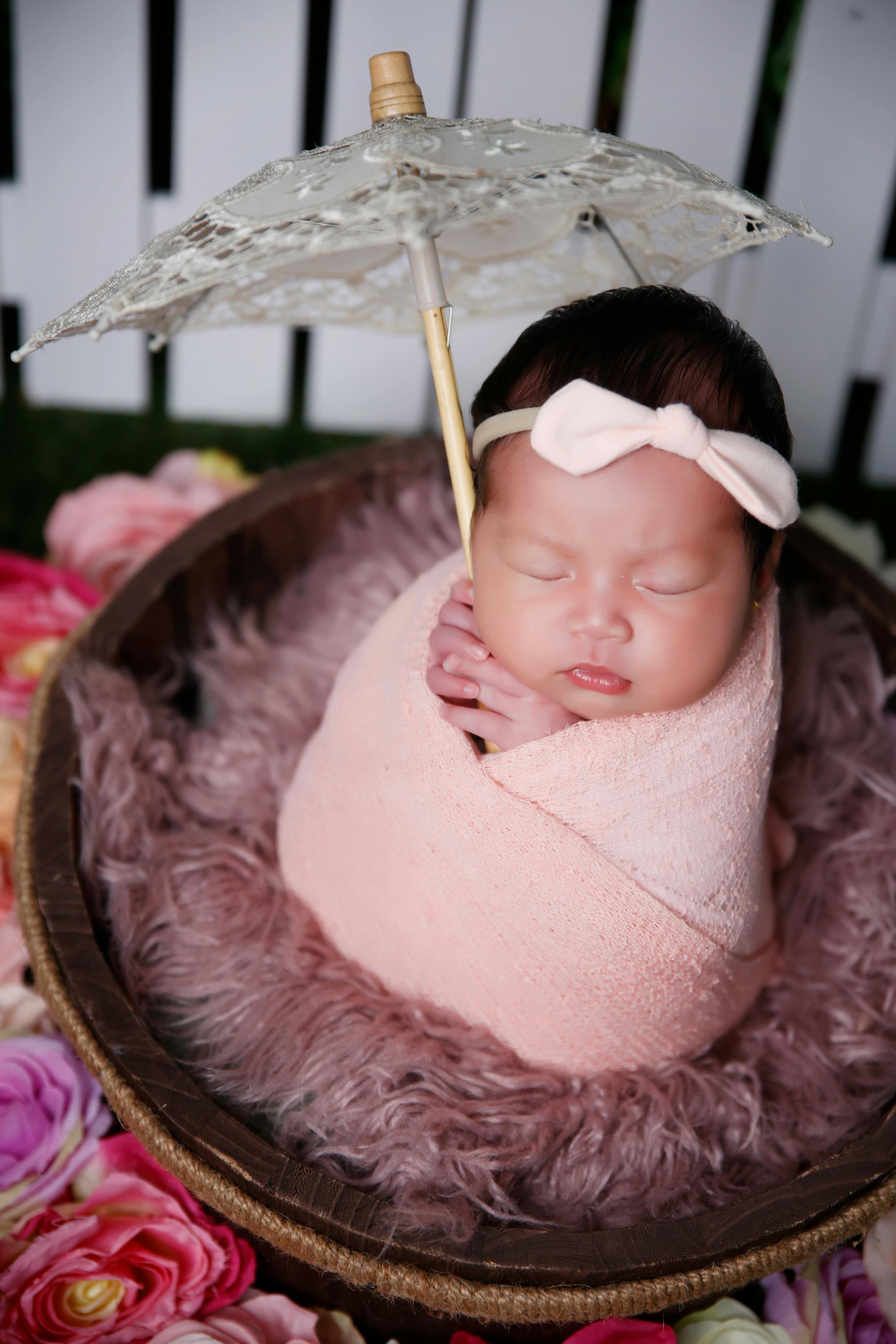 Newborn with Umbrella · Free Stock Photo