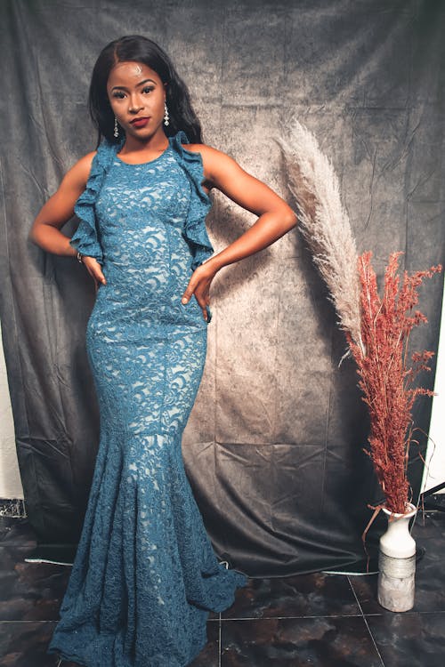Woman Posing in Blue Dress