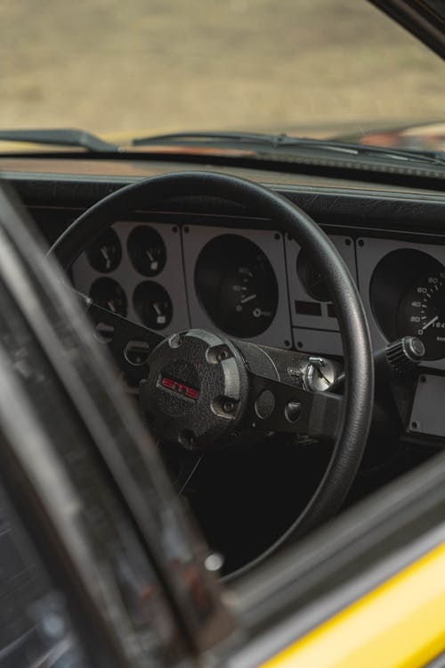 Close-Up Shot of a Steering Wheel