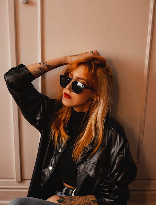 Beautiful Woman in Leather Jacket and Sunglasses