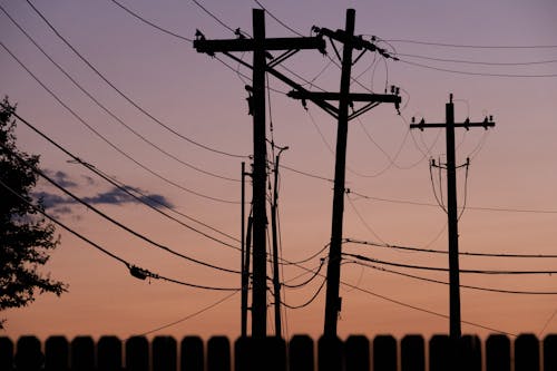 Silhouette Photos of Electric Posts