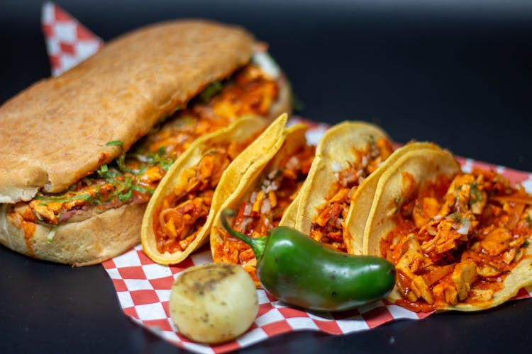 Photo Of Three Tacos And A Torta 