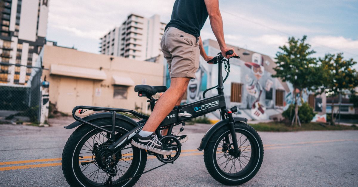 Person Rider A Person Riding Bicycle · Free Stock Photo