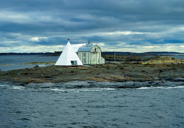 House And Tent On Island