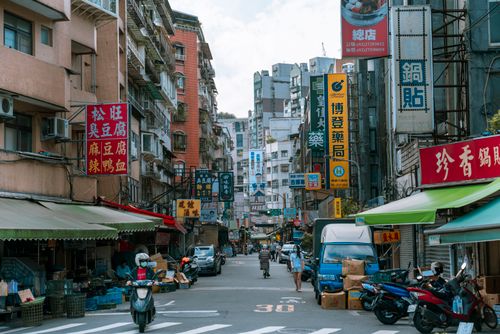 Free Vibrant street view in Taipei showcasing bustling market activity and urban life. Stock Photo