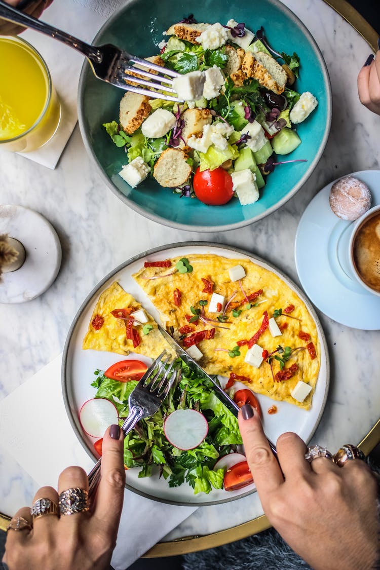 Eating Salads In A Restaurant 