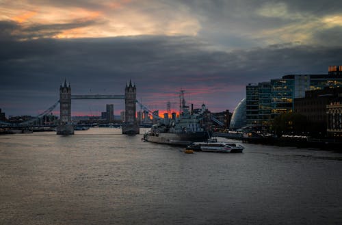 Cityscape of London with London Bridge in Middle at Sunset