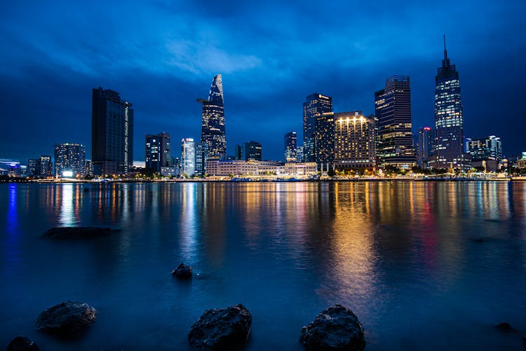 A City Buildings Near The Saigon River At Night