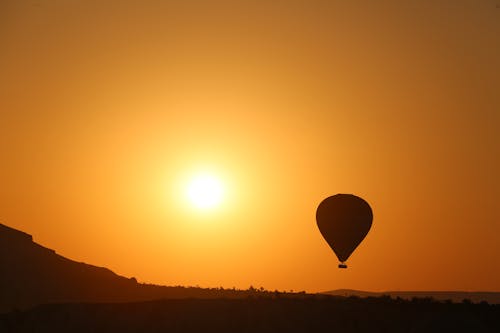 Silhouette of a Hot Air Balloon during Sunset