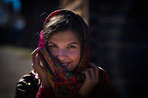 Woman Holding Pink Floral Scarf