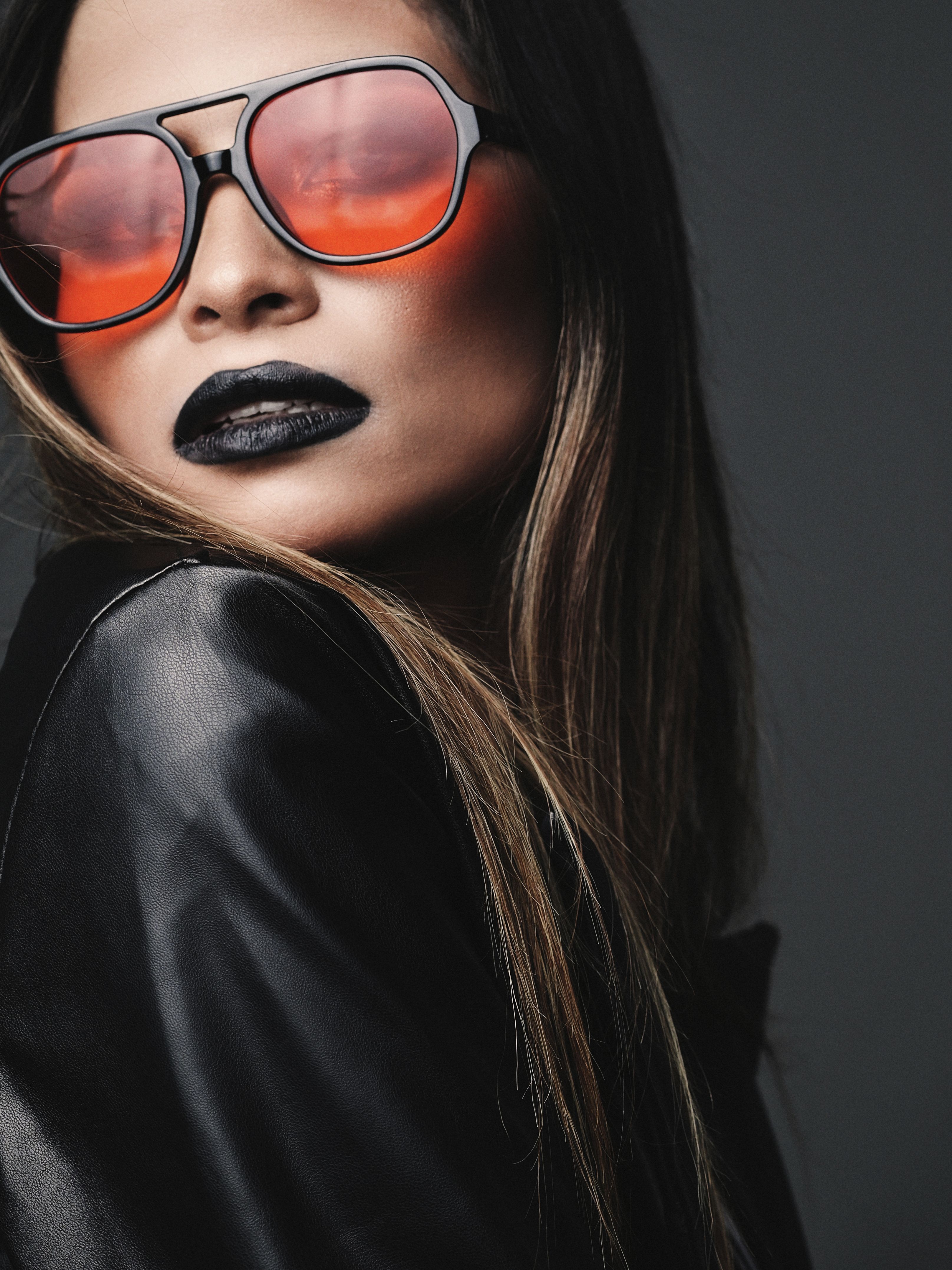 Woman Wearing Black Sunglasses and Black Leather Jacket · Free Stock Photo
