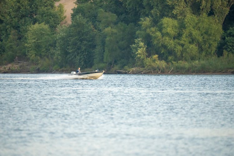 Photo Of A Boat On Lake