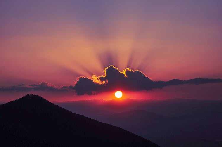 Silhouette Of Mountain During Sunset