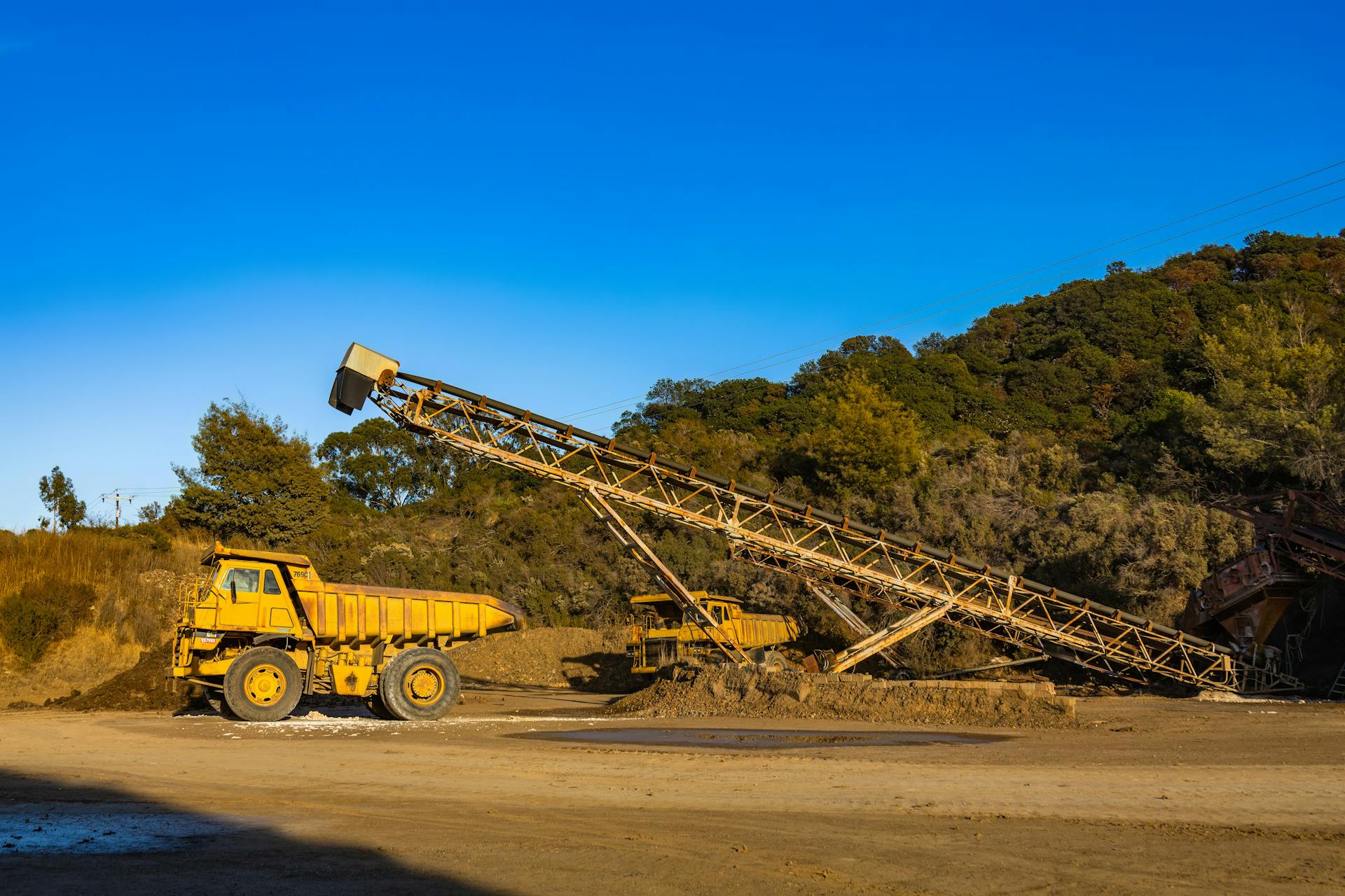 Yellow and Black Heavy Equipment on Road