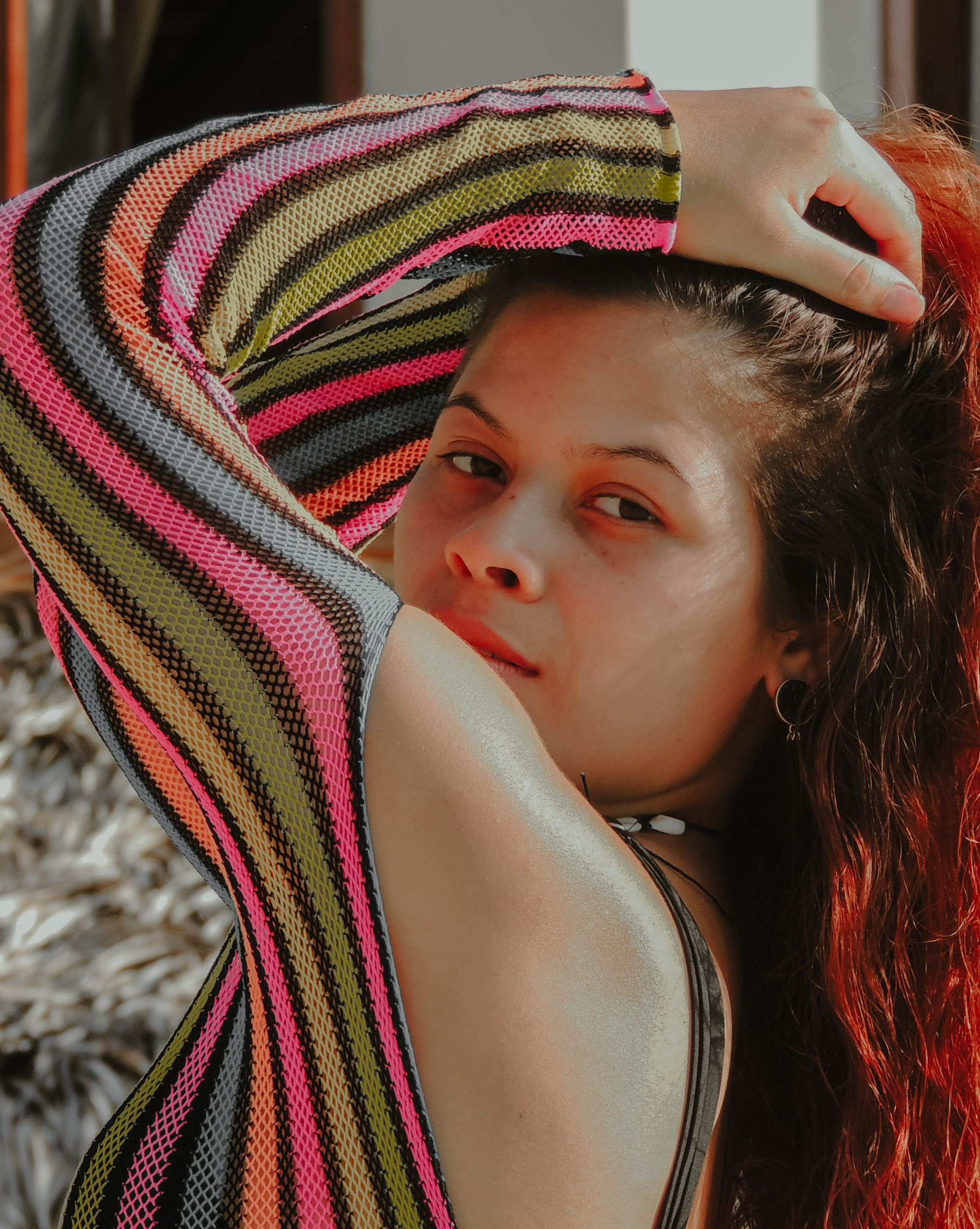A Woman Posing with Her Hand on Her Head · Free Stock Photo