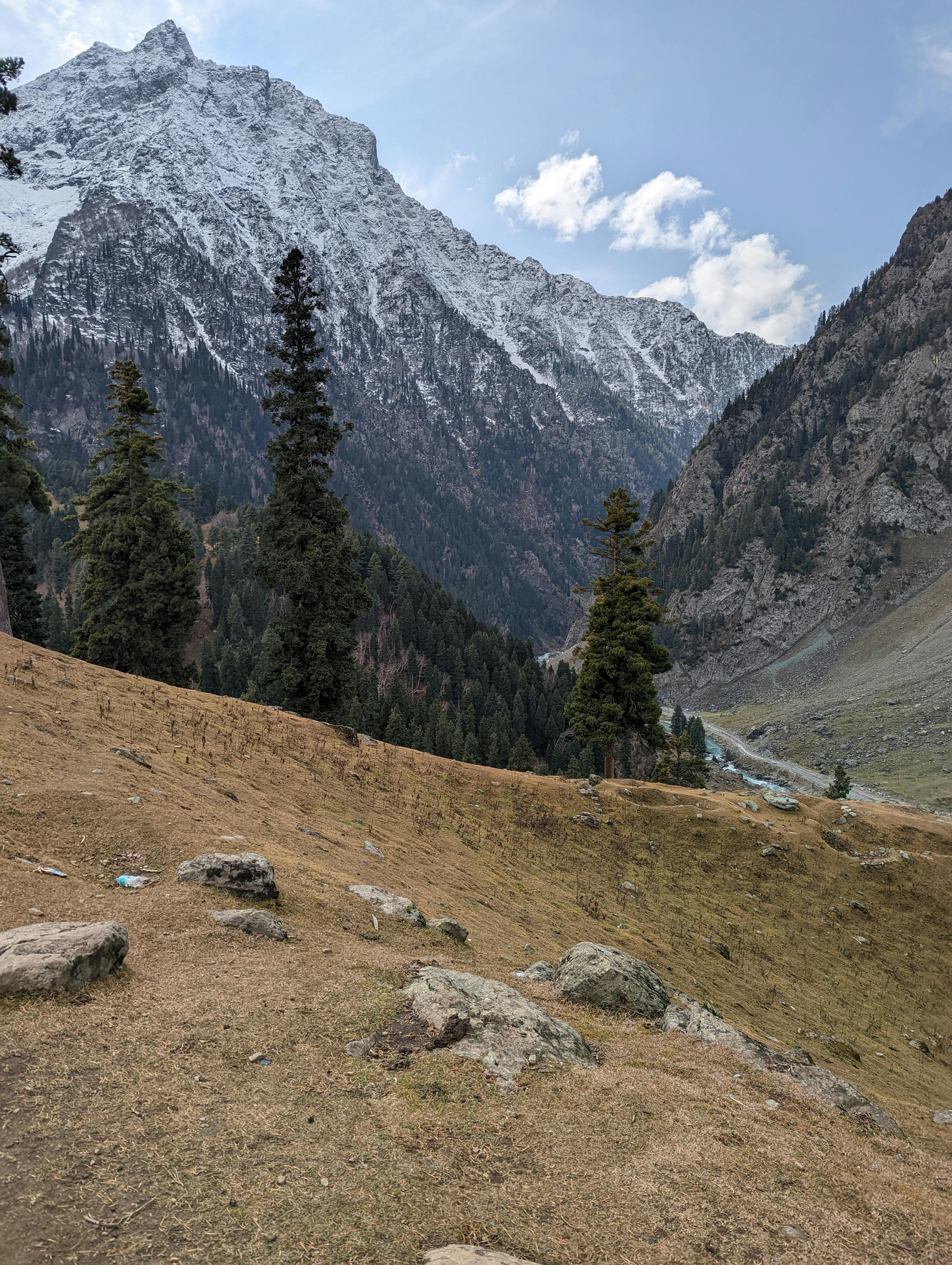 Marvel at the breathtaking snow-covered peaks of Sonamarg, captured in striking detail.