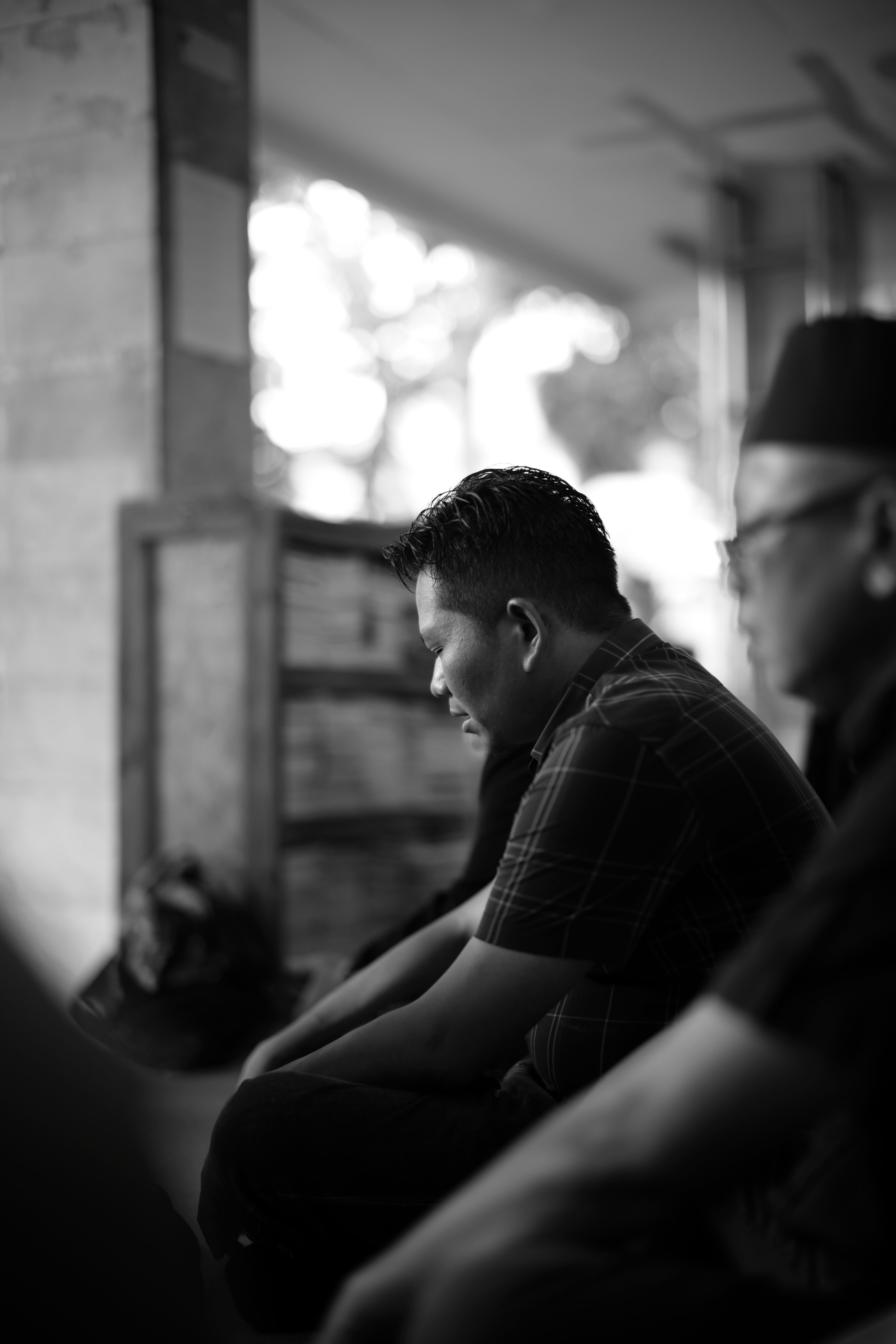Black and white profile of a man immersed in thought, Semampir, East Java.