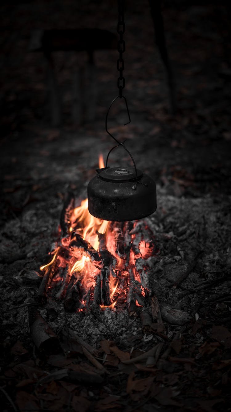 Black Kettle On Fire During Nighttime