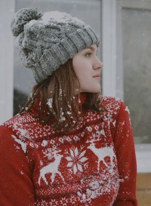 Ribbed knit beanie worn in winter light — photo by Darya Grey_Owl on Pexels