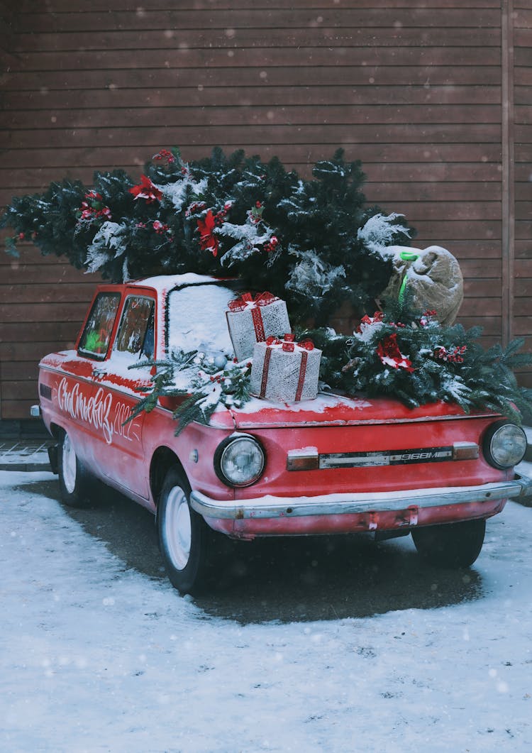 Christmas Tree On A Vintage Car 