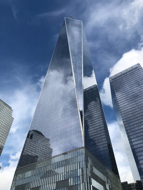 Modern Glass Building Under the Cloudy Sky