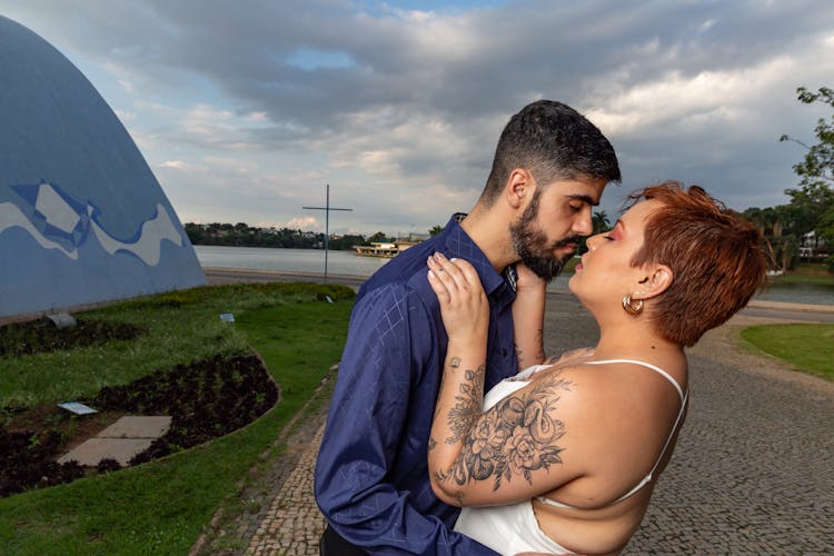 Bearded Man Kissing Woman 