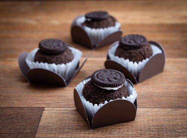 Chocolate Desserts On Wooden Table Top