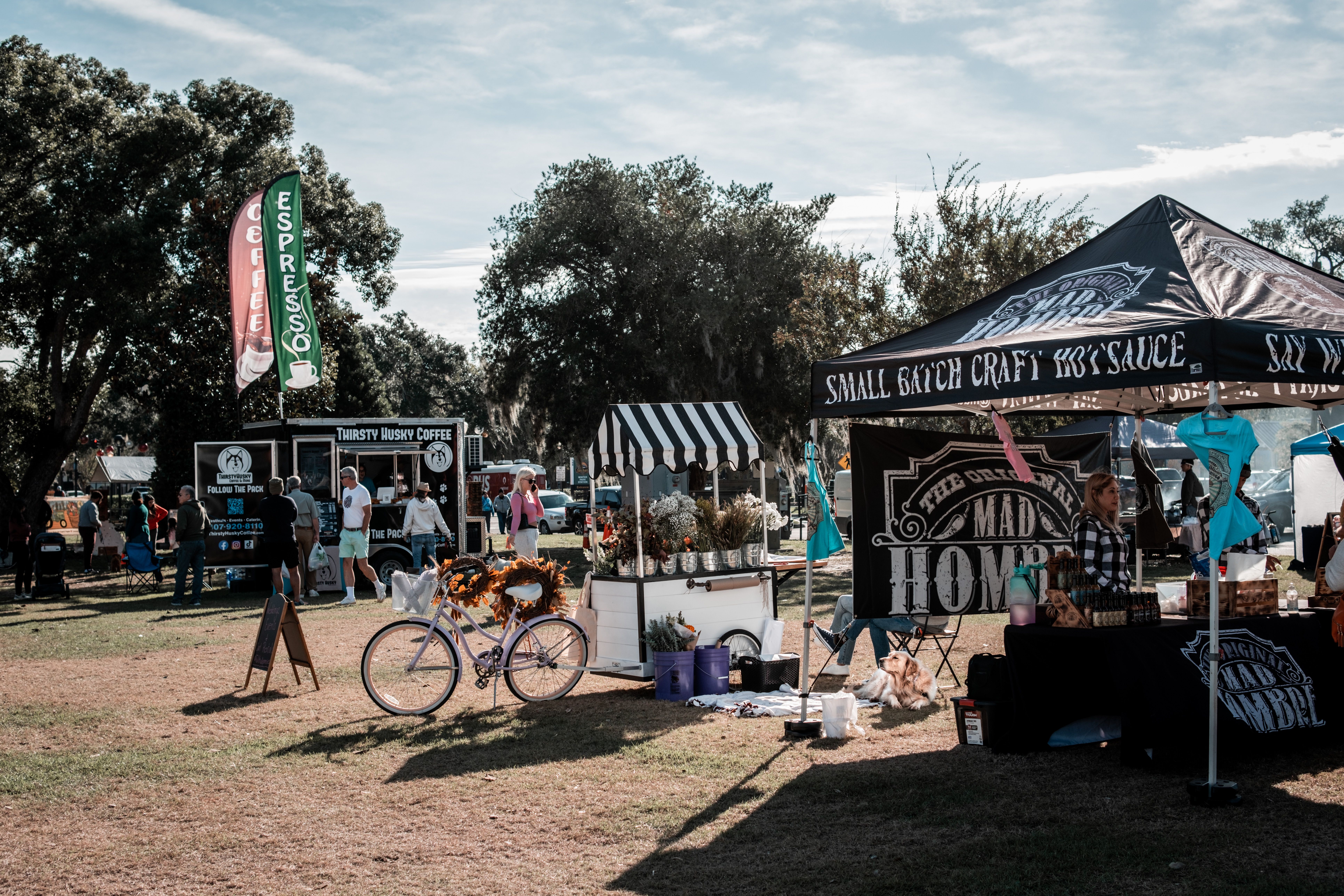 Outdoor market with vendor booths and tents