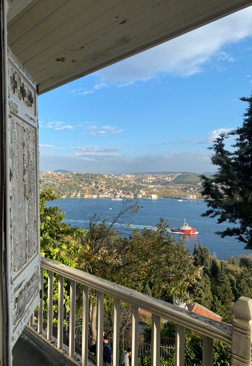Free A picturesque view of the Bosphorus Strait from a charming wooden balcony, perfect for travel and relaxation. Stock Photo