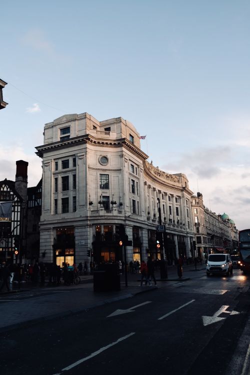 Free A bustling street scene on Regent Street, London with iconic architecture at dusk. Stock Photo